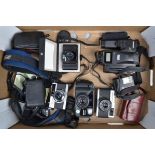 35mm Film Cameras, an Olympus Trip 35, a Minox 35 GL camera with maker's ERC and presentation box, a