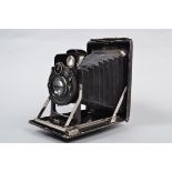 A KW Patent Etui Folding Plate Camera, 9 x 12cm format, shutter sticking on slow speeds, body G,