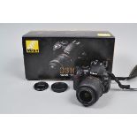 A Nikon D3100 18-55 VR Kit, including a D3100 DSLR body, serial no 7654379, body VG, an AF-S