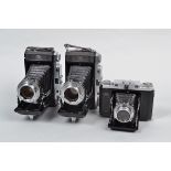 Three Zeiss Ikon Ikonta Folding Cameras, an Ikonta 524/16, shutter sluggish on slow speeds,