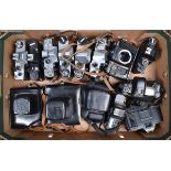 A Tray of SLR Camera Bodies, Praktica, Zenit examples, a Voigtlander VSL1, Canon T80 (2), Ricoh KR-