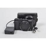 A Sony Cyber Shot DSC HX60V Digital Compact Camera, powers up, appears to function as should, with