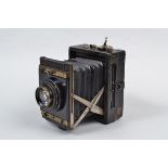 A Contessa Nettel Folding Strut Camera, 9 x 12cm format, shutter loads and fires, creasing to