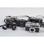 Compact Cameras, a Ricoh 500 G, a Fujica Half, a Lomo LC-A, shutters fire, otherwise untested, a