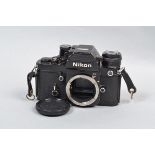A Nikon F2AS Photomic SLR Body, black, serial no 7703144, body F, wear and brassing, shutter