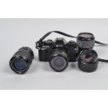 A Group of Nikon Mount Lenses and a Ricoh KR-10X SLR Camera, comprising a Nikon Series E 50mm f/1.