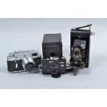 A Rollei B35 and Other Film Cameras, comprising a black Rollei B35, made in Singapore, serial no