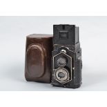 A Zeiss Ikon Ikoflex Coffee Can TLR Camera, 850/16, serial no on film cartridge Y89491, shutter