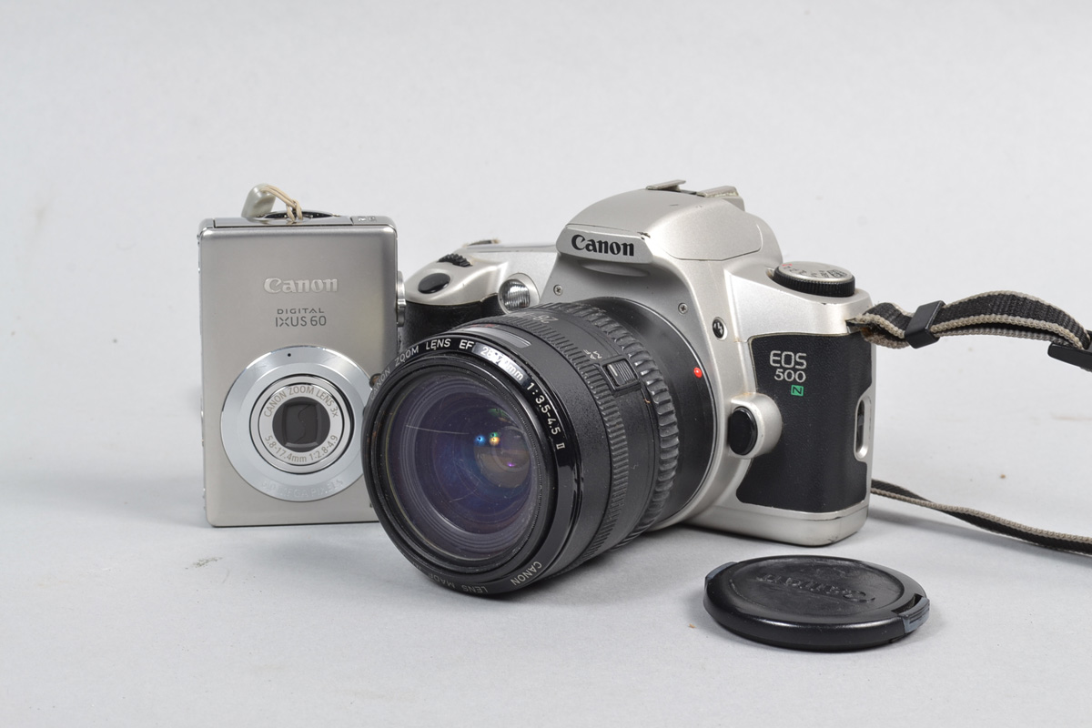 A Canon EOS 500 35mm SLR Camera, serial no. 2227948, mock titanium body G, shutter working, meter