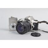 A Canon EOS 500 35mm SLR Camera, serial no. 2227948, mock titanium body G, shutter working, meter