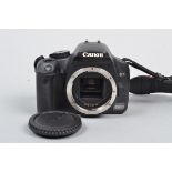 A Canon EOS 450D DSLR Camera Body, powers up, appears to function as should, body VG, with body cap,