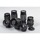 A Group of OM mount Lenses, a Tokina 17mm f/3.5 lens, barrel G, elements G, a Kiron 28mm f/2.8 lens,