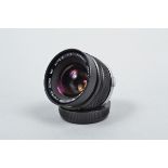 An Olympus MC Auto W 35mm f/2 Wide Angle Lens, OM mount, Zuiko, serial no 145970, barrel G-VG,