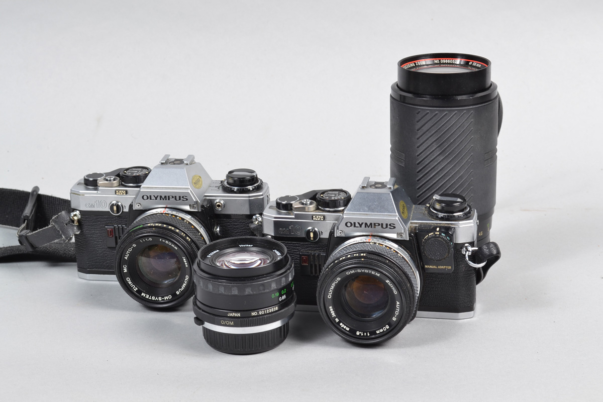 Two Olympus OM10 SLR Cameras, serial no 2743960 body G, shutter working with Manual Adapter,