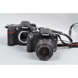 A Nikon D7000 DSLR Body and a Canon DSLR Camera, comprising a Nikon D7000 body, serial no 6241575,