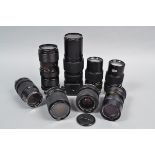 Olympus OM Zoom Lenses, a S Zuiko 35-70mm f/4 Auto Zoom, a Zuiko 35-105mm f/3.5-4.5 Auto Zoom, three