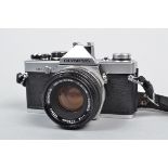 An Olympus OM 2 SLR Camera, serial no 508614, shutter working, meter responsive, timer working, body