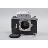 A Nikon F Photomic Camera Body, chrome, serial no 6567171, with photomic T finder, with F36 motor