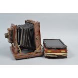 A Half Plate Mahogany and Brass Field Camera condition P, rear frame and supporting struts