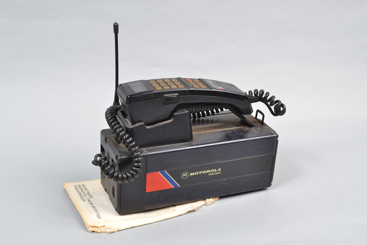 A Motorola 500X Cellular Mobile Phone circa mid 80's brick phone, with aerial, manual, untested