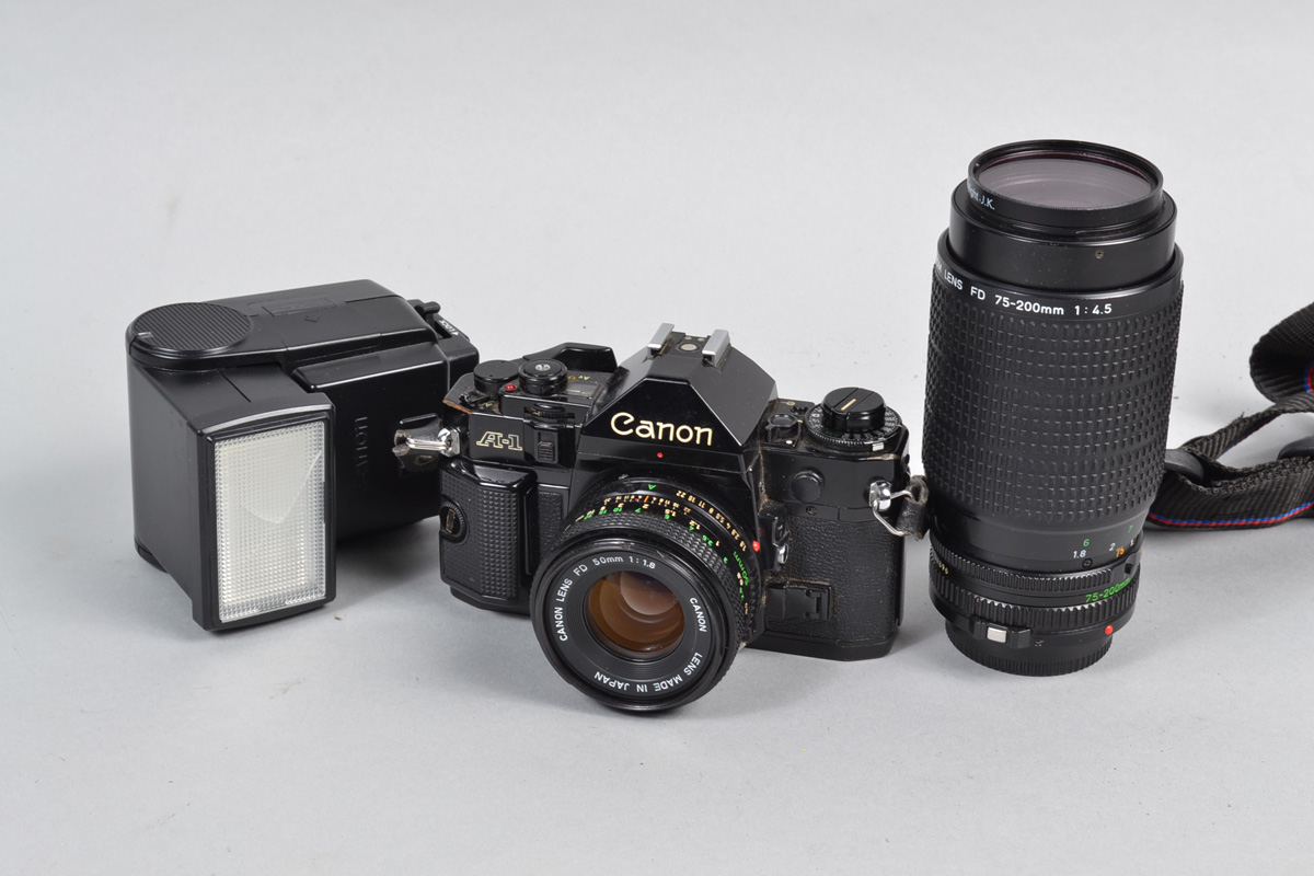 A Canon A-1 SLR Camera Outfit, serial no 812730, body F-G, shutter working with "squeak", meter