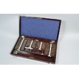 An Optician's Lens Set in Wooden Case, made by Gowllands Ltd, Croydon, comprising spherical