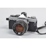 An Olympus OM 2 Camera, serial no 573998, shutter working, meter responsive, body G-VG, with G.