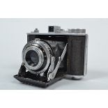 An Olympus Chrome Six I Folding Camera, 4.5 x 6. 6 x 6, dual format, serial no 33962, shutter