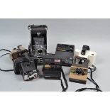 Instant Cameras, two Kodak EK160. a Polariod Pathfinder 110 and Polariod 1500, Swinger model 20,