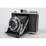 An Olympus Chrome Six II Folding Camera, 4.5 x 6. 6 x 6, dual format, serial no 35938, shutter