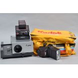 A Polaroid SX-70 Instant Camera and Other Items, a Polaroid SX-70 Land Camera Model 2 with maker's