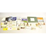 A collection of various stamps, including contemporary presentation packs, some relating to cats,