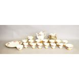 A Paragon bone china coffee and tea service, the Six World Famous Roses after designs by Harry