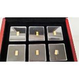 A Windsor Mint commemorative Million Dollar 14ct gold collection, each in perspex mount 7mm x