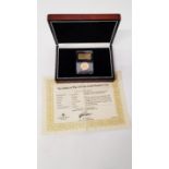 A commemorative 22ct gold Battle of The Atlantic Piedfort £1 coin, contained in perspex case and box