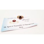 A certificated apricot tourmaline and diamond 9ct gold dress ring, the oval mixed cut tourmaline