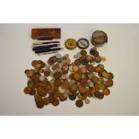 A collection of British and world coinage, including a quantity of pennies, a 1937 half crown,