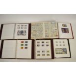 Fourteen stamp albums containing mostly Crown Dependency stamps, including Isle of Man, Jersey,