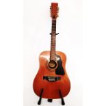 An acoustic Shaftesbury Rodeo 12 guitar, with twelve strings and, figured walnut back with ivorine