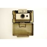 A polaroid 103 land camera automatic