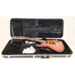 An Ibanez six string electric guitar, mahogany smoked effect body, beech and hardwood mother of