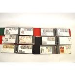 Six albums of First Day Covers, each album containing a good quantity of FDCs together with eight