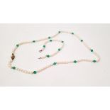A string of simulated and glass bead pearls, on silver gilt clasp, 67cm with a matching bracelet,