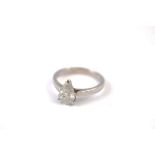 A certificated diamond solitaire, the pear cut diamond in three claw setting on a white 18ct gold