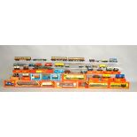 A quantity of boxed and unboxed Hornby OO Gauge rolling stock, including coaches, wagons, etc.