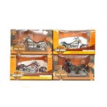 Four 1:10 American Muscle Ertl Collectibles Harley-Davidson motorcycle models, all boxed.