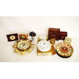 A collection of wall clocks, including some by Westclox, an Usher Red Star electric wall clock and