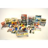 A collection of assorted boxed VW Beetle diecast models, including Cararama, Micro machines, New