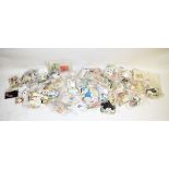 A large bagged quantity of assorted stamps, mostly Commonwealth examples, countries include
