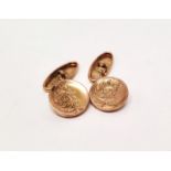 A pair of 9ct gold chain linked cufflinks, with circular fronts and oval backs, engraved design